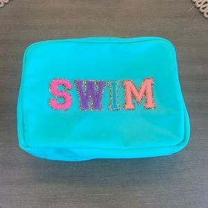 Stoney Clover Lane large pouch with sewn patches